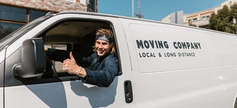 A professional mover in the van.
